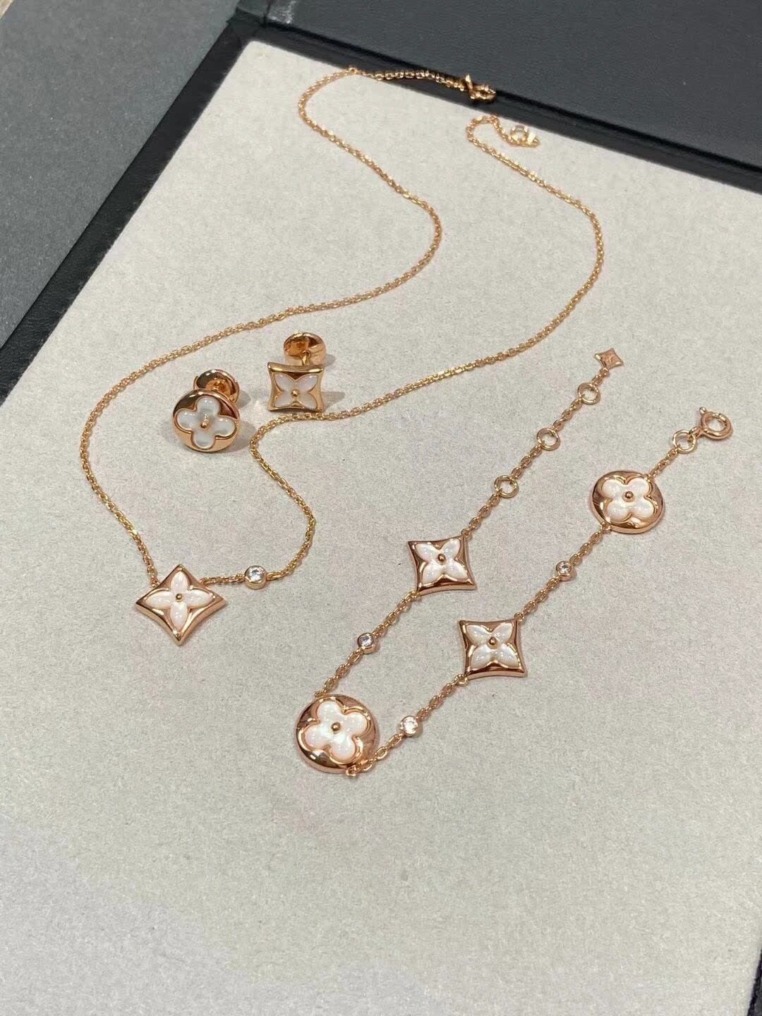 Louis Vuitton Gold Flower Earrings and Bracelet Set Louis Vuitton Gold Flower Earrings and Bracelet Set